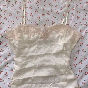 Coquette style cream colored lingerie tank top.